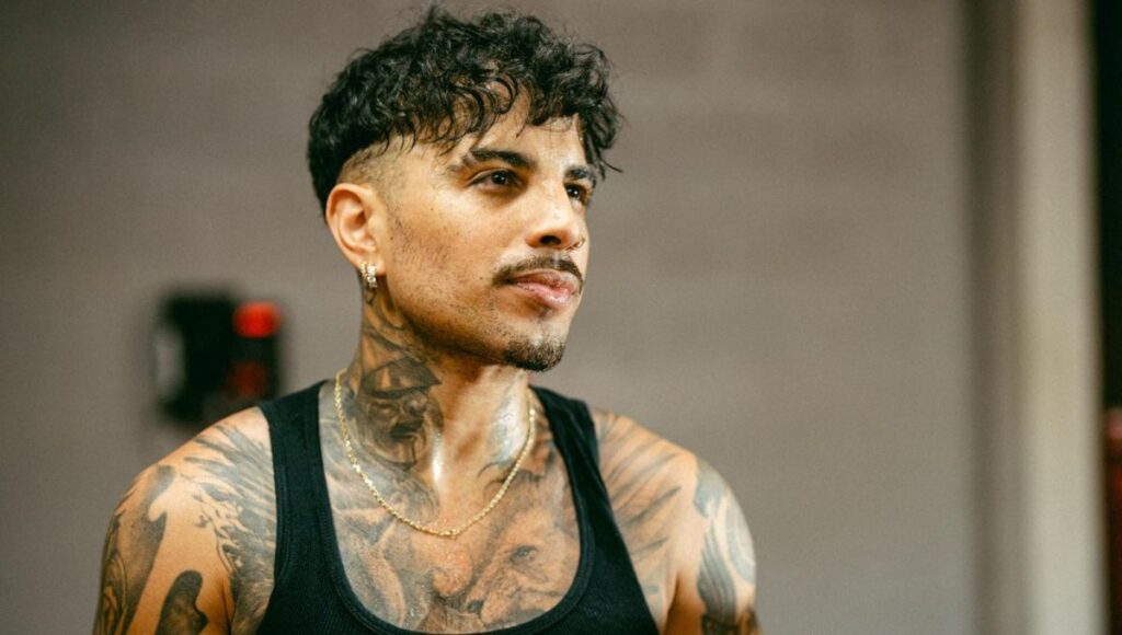 Qué dice la letra de Tú con él de Rauw Alejandro